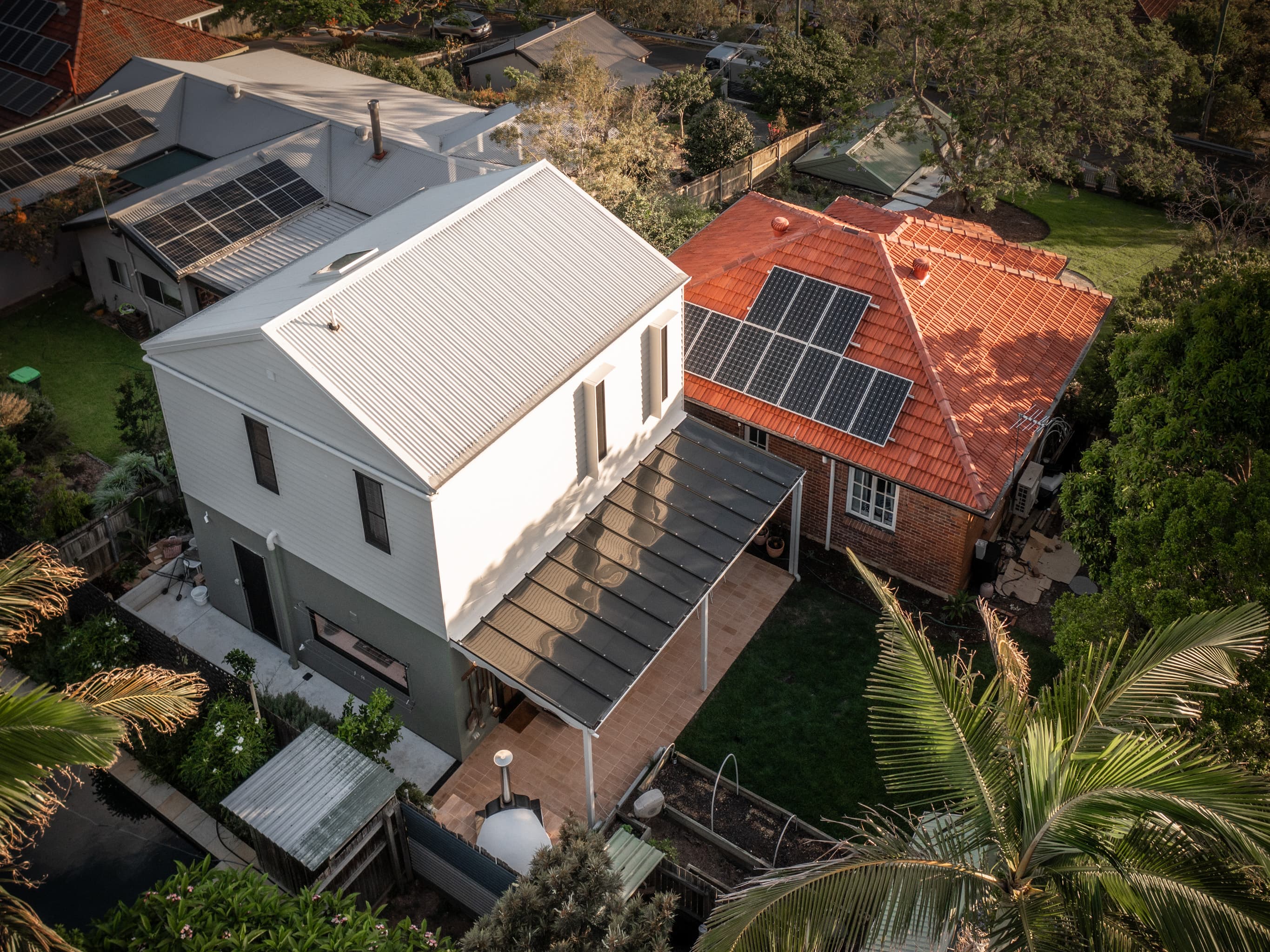 Jacaranda Highside from above, the new gabled addition behind the original tile-roofed cottage