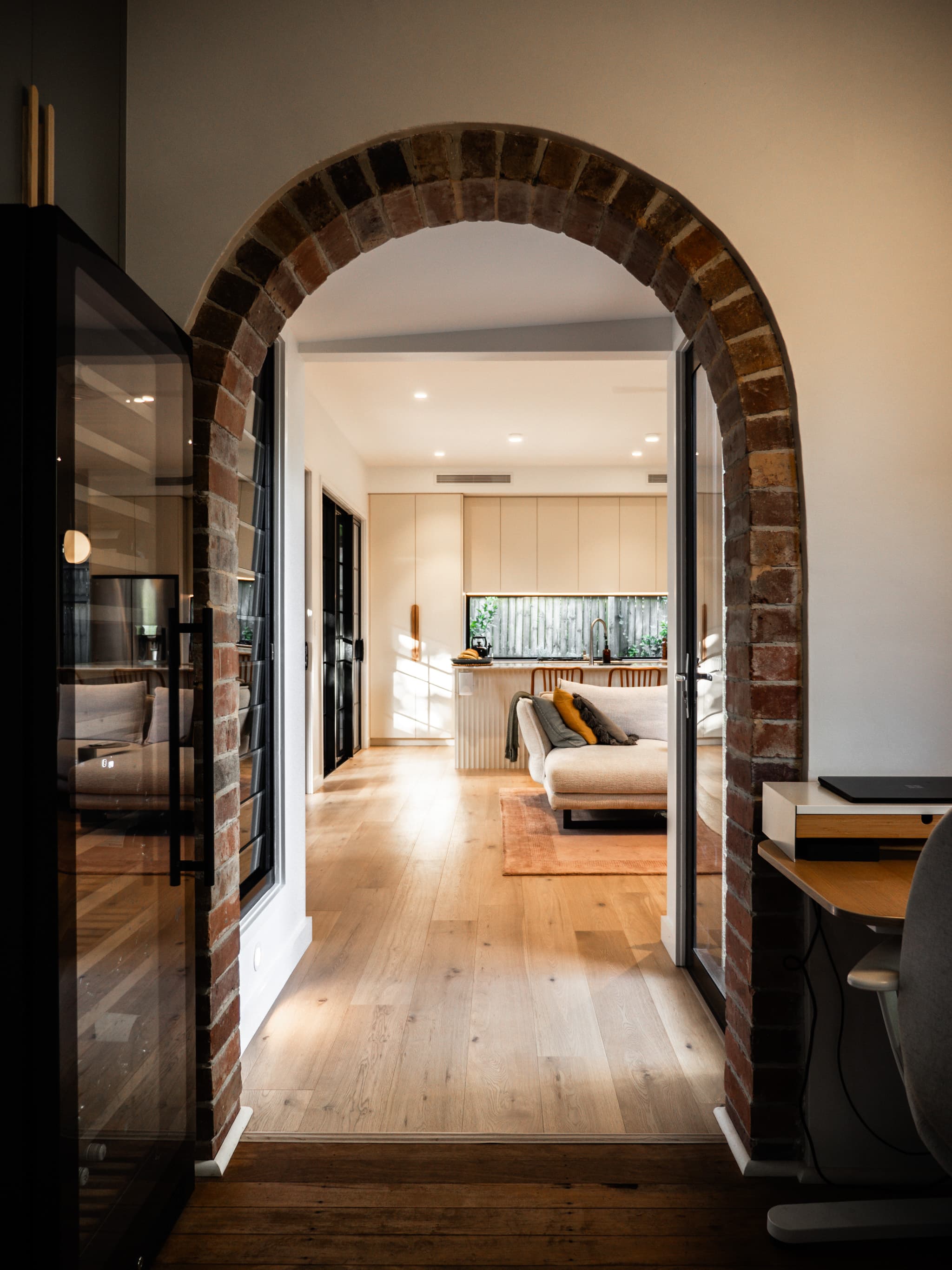 Jacaranda Highside original brick archway framing the new open-plan living