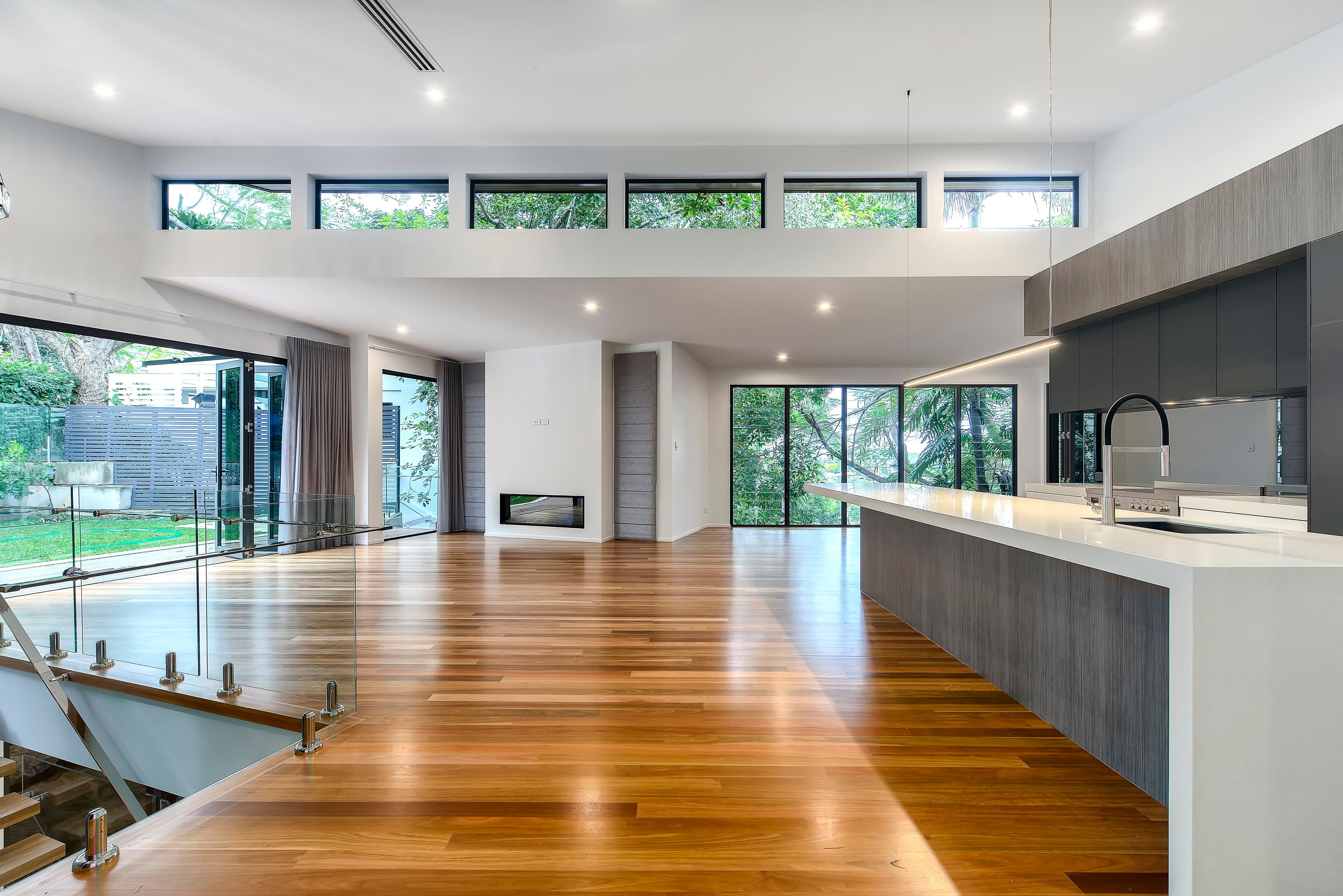 Langside Road open-plan living with a clerestory window band and fireplace