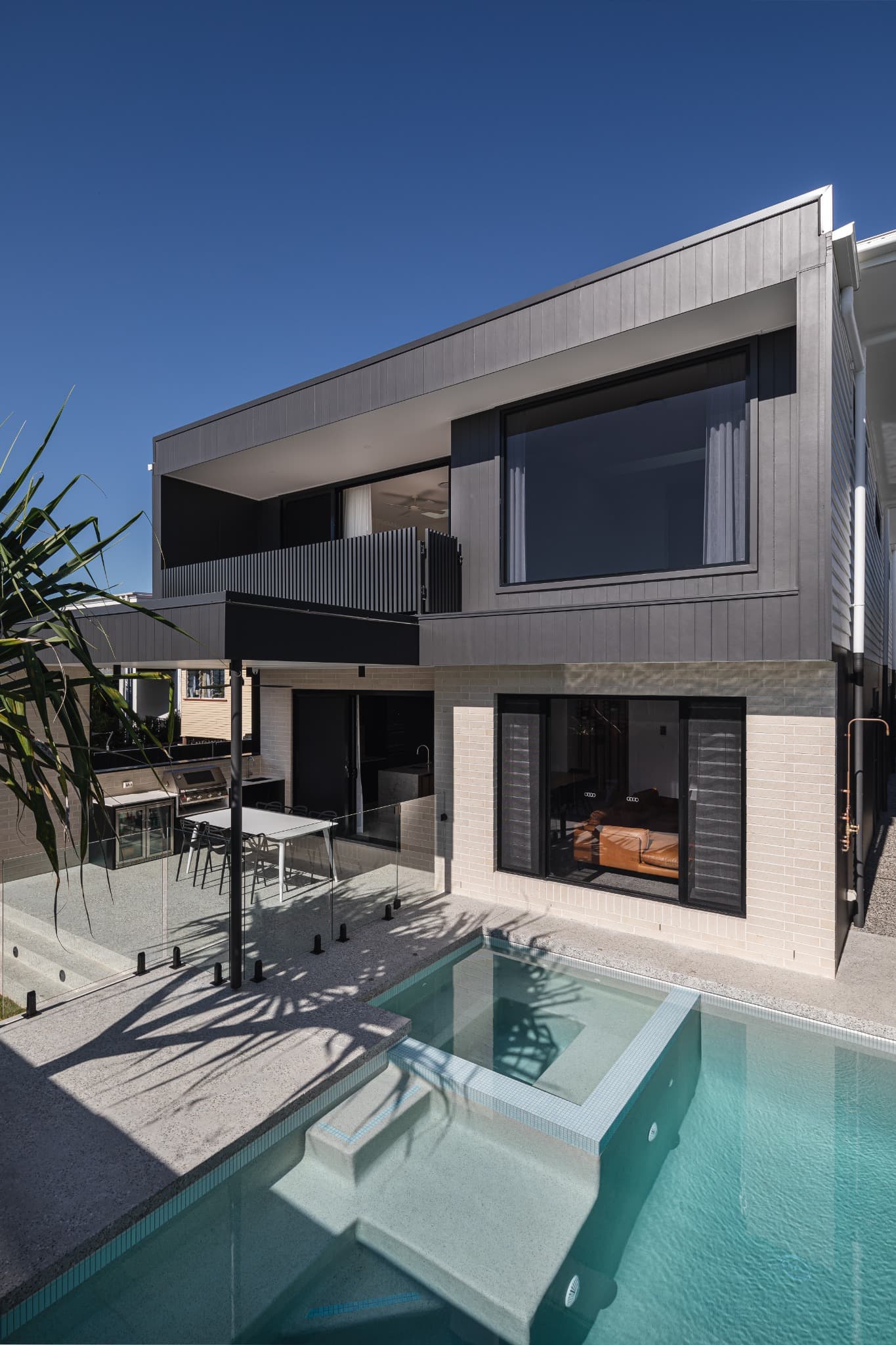 Melville Terrace pool and rear elevation in grey cladding over pale brick