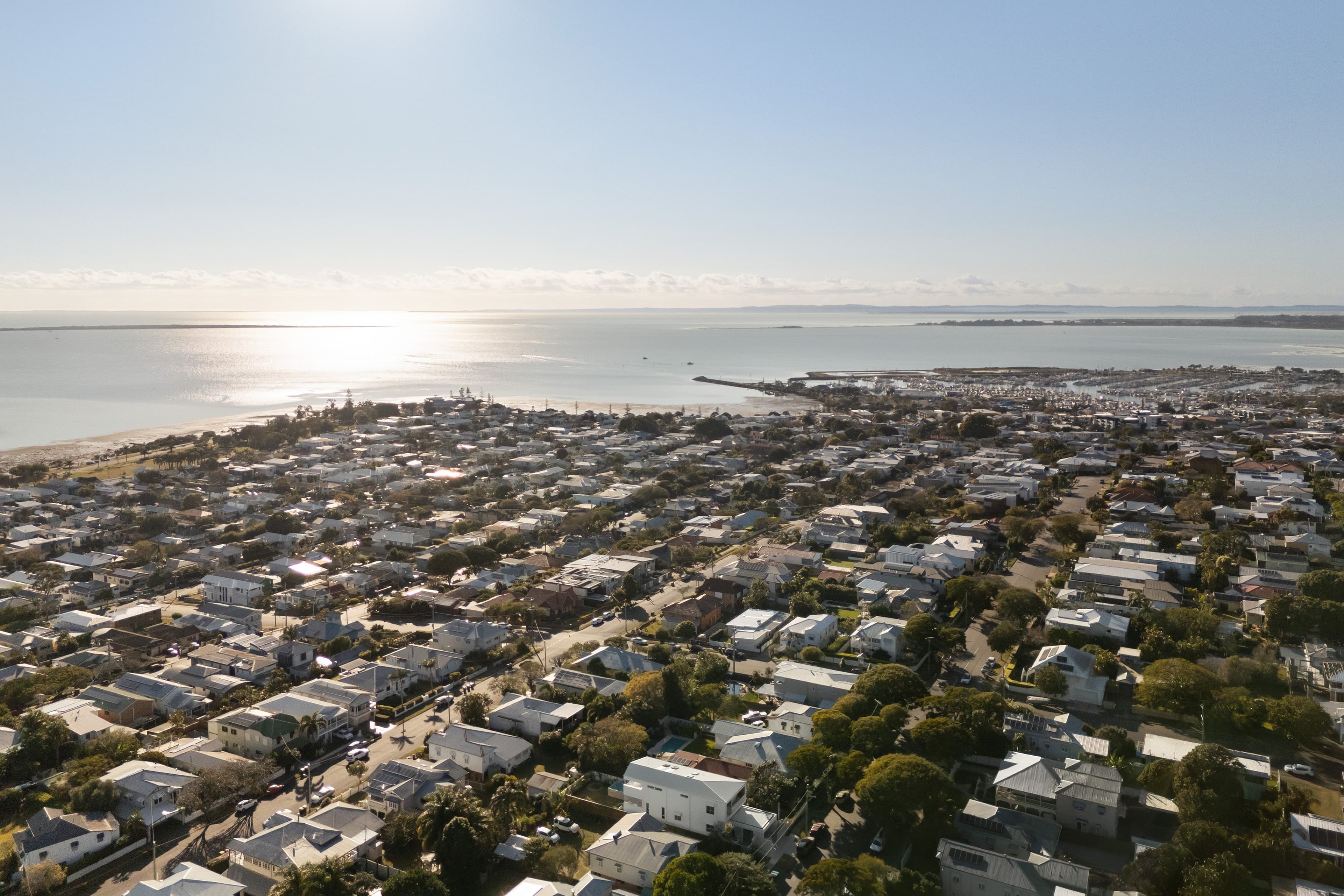 Mesa and its bayside neighbourhood from the air, water and marina beyond